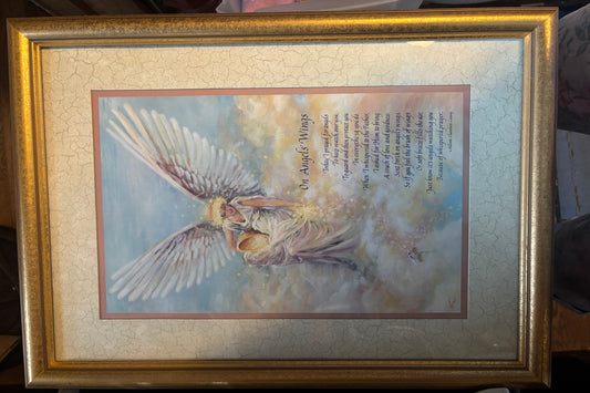 GOLD FRAMED ON ANGELS WINGS